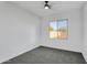 This bedroom features a window that lets in light and a ceiling fan to keep the room cool at 8137 W Pueblo Ave, Phoenix, AZ 85043