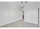 This bedroom offers closet space and neutral walls that provide a blank canvas for personalization at 8137 W Pueblo Ave, Phoenix, AZ 85043