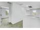 Bright hallway with carpet and white walls at 8137 W Pueblo Ave, Phoenix, AZ 85043