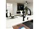 Open concept kitchen island with a black faucet, sink and a clear view into the Gathering room at 8137 W Pueblo Ave, Phoenix, AZ 85043