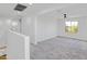 Bright and airy loft featuring a window and plenty of space to be used as a multi-purpose room at 8137 W Pueblo Ave, Phoenix, AZ 85043