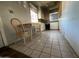 A kitchen featuring a vintage table with a window view, blending functionality and natural light for an open feel at 829 W Spray St, Superior, AZ 85173