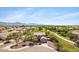 Beautiful home with a two-car garage surrounded by mature trees with mountain views in a lush community at 8920 S 40Th Ln, Laveen, AZ 85339