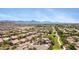 Beautiful home with a two-car garage surrounded by mature trees and mountain views in a lush community at 8920 S 40Th Ln, Laveen, AZ 85339