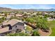 Backyard view of a house with an enclosed yard, featuring desert landscaping and mountain views at 8920 S 40Th Ln, Laveen, AZ 85339