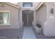 Inviting home entrance with decorative double-doors and manicured landscaping at 8920 S 40Th Ln, Laveen, AZ 85339