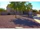 Charming home featuring low maintenance desert landscaping in the front yard at 8920 S 40Th Ln, Laveen, AZ 85339