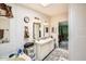Bright bathroom featuring double sinks, ample counter space, and tub at 9431 E Coralbell Ave # Ofc, Mesa, AZ 85208
