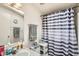Bathroom featuring a shower with curtain and a single sink at 9431 E Coralbell Ave # Ofc, Mesa, AZ 85208