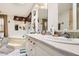 Bright bathroom featuring double sinks, ample counter space, and tub at 9431 E Coralbell Ave # Ofc, Mesa, AZ 85208