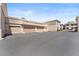 Attached garages for residential units with ample parking in the front at 9550 E Thunderbird Rd # 214, Scottsdale, AZ 85260