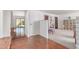 Inviting foyer with a blend of flooring, leading to a bright living area and featuring unique architectural details at 9623 N 34Th Pl, Phoenix, AZ 85028