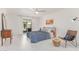 Bright bedroom with white walls and a view of the private outdoor pool area at 9623 N 34Th Pl, Phoenix, AZ 85028