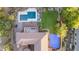 Aerial view of a luxury home with a pool, backyard, and outdoor living space at 9753 E Suncrest Rd, Scottsdale, AZ 85262
