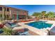 The house includes a pool, outdoor patio, landscaping, and space for relaxing outside at 9753 E Suncrest Rd, Scottsdale, AZ 85262
