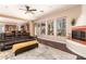Inviting living room with a fireplace, tile floors, and open layout, perfect for modern living at 9753 E Suncrest Rd, Scottsdale, AZ 85262