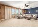 Expansive living area with comfortable seating, natural light, and scenic outdoor views at 9753 E Suncrest Rd, Scottsdale, AZ 85262