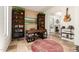 Well-lit office space with built-in bookshelves and desk, creating a functional and stylish workspace at 9753 E Suncrest Rd, Scottsdale, AZ 85262