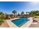 Beautiful pool area includes desert landscaping, space for relaxing, and plenty of desert sunlight at 9753 E Suncrest Rd, Scottsdale, AZ 85262
