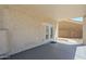 Covered back patio with sliding glass doors at 1031 W Longhorn Dr, Chandler, AZ 85286