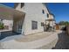 Home exterior featuring a covered patio, sidewalk, and desert landscaping for low maintenance living at 1031 W Longhorn Dr, Chandler, AZ 85286