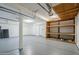 Three-car garage with built-in shelves for organization and storage at 1031 W Longhorn Dr, Chandler, AZ 85286