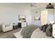 Spacious bedroom with high ceilings, neutral tones, and elegant furnishings at 1031 W Longhorn Dr, Chandler, AZ 85286