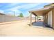 Spacious backyard with a covered patio perfect for outdoor entertaining and relaxation at 10334 E Diamond Ave, Mesa, AZ 85208