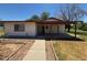 Well maintained ranch style home with a nice walkway and yard at 121 E Ivanhoe St, Gilbert, AZ 85295