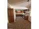 Well appointed kitchen featuring hardwood cabinetry and sleek white appliances at 121 E Ivanhoe St, Gilbert, AZ 85295