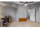 Home office features a desk and storage chest providing a flexible work-from-home area at 1231 W Mediterranean Dr, Gilbert, AZ 85233