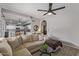 Spacious living room adjacent to the kitchen and dining area providing an open concept with great flooring at 1231 W Mediterranean Dr, Gilbert, AZ 85233
