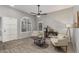 Bright living room featuring stylish furniture, a nice window, and light gray walls with lovely flooring at 1231 W Mediterranean Dr, Gilbert, AZ 85233
