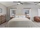 Main bedroom with carpet floors, windows, and stylish decor at 1231 W Mediterranean Dr, Gilbert, AZ 85233