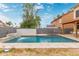 Beautiful pool with a waterfall feature, perfect for relaxation and recreation at 1231 W Mediterranean Dr, Gilbert, AZ 85233