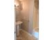 Cozy bathroom with tile flooring, white fixtures, and a shower/tub combo at 14021 N 29Th St, Phoenix, AZ 85032