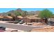 Charming single-story home with desert landscaping, a tile roof, and mountain views at 14021 N 29Th St, Phoenix, AZ 85032