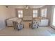 Inviting living room with neutral paint, tile flooring and natural lighting at 14021 N 29Th St, Phoenix, AZ 85032
