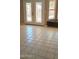 Living Room featuring tile floors, windows and doors at 14021 N 29Th St, Phoenix, AZ 85032