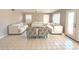 Bright living room with tiled flooring and large windows provides natural light at 14021 N 29Th St, Phoenix, AZ 85032