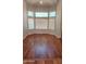Living room with hardwood floors and a bay window at 14021 N 29Th St, Phoenix, AZ 85032