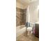 Cozy bathroom with a shower-tub combo, decorative tile surround, toilet, and vanity at 14620 N Yerba Buena Way # B, Fountain Hills, AZ 85268