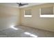 Bedroom with carpet flooring and two windows with natural light at 14620 N Yerba Buena Way # B, Fountain Hills, AZ 85268
