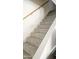 Carpeted staircase with wooden handrail, leading to the upper level of the home, providing safe and stylish access at 14620 N Yerba Buena Way # B, Fountain Hills, AZ 85268