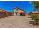 Two story home with a covered patio and rock yard at 15440 S 38Th St, Phoenix, AZ 85044