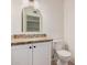 Bathroom vanity with granite counters and white cabinetry at 15440 S 38Th St, Phoenix, AZ 85044