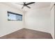 Bedroom featuring a ceiling fan and wood floors at 15440 S 38Th St, Phoenix, AZ 85044