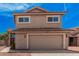 Charming two-story home with a terra cotta roof and desert landscaping at 15440 S 38Th St, Phoenix, AZ 85044