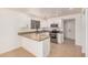 Well-lit kitchen with stainless steel appliances, and granite counters at 15440 S 38Th St, Phoenix, AZ 85044