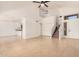 Bright and airy living room featuring tile floors, high ceilings, and staircase at 15440 S 38Th St, Phoenix, AZ 85044